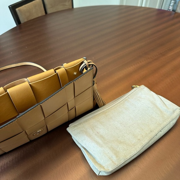 Michael Kors Woven Leather Clutch with Tassels and Strap Tan - Picture 9 of 11